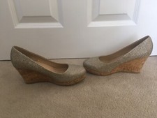 Stylish Tu Sainsburys gold glitter wedge shoes. Size 6