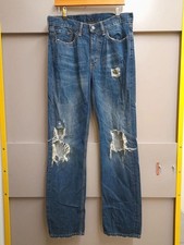 Levi's 514 ripped straight leg jeans