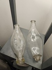 A pair of vintage baby feeder