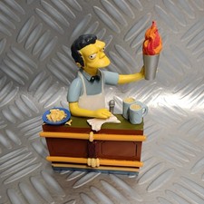 The Simpsons sculpture "Drink Up, Chumps" Springfield citizens sculpture Moe