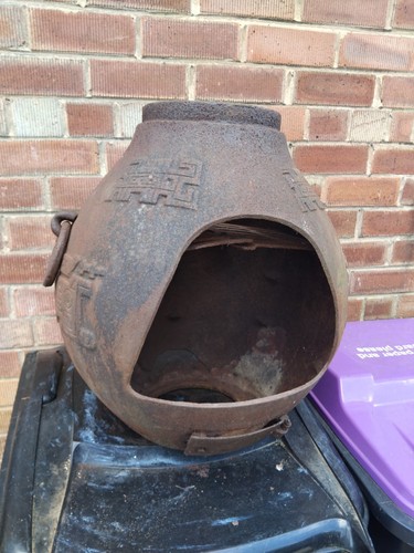 Cast iron chiminea hold and - cast,