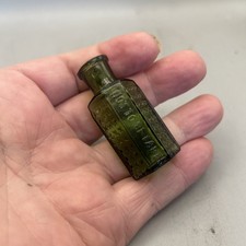 EXTREMELY SMALL COFFIN SHAPED VICTORIAN POISON BOTTLE VARIANT 2 DRAM SIZE