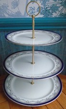 3 tier cake stand  vintage plates with floral gilt swags  & a gilt rim