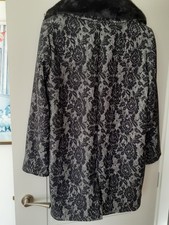 Beautiful John Rocha coat in 16 size It  is in Black tones with a Fur Collar. 