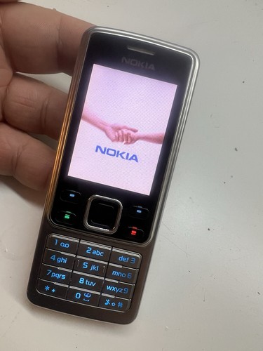Nokia 6300 mobile phone locked - mobile,