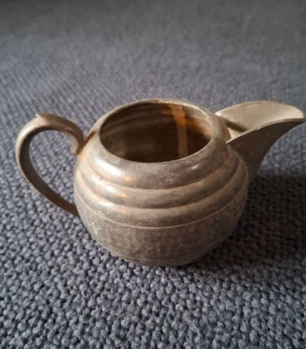 Old hand beaten - pewter, jug