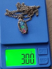 Beautiful  Opal Pendant Set In 9ct With 9ct Gold Chain .