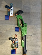 A toy Shotgun alongside two