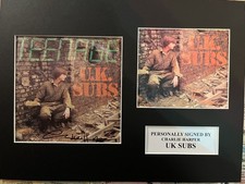 UK SUBS- SIGNED (7” cover cutting) +7” Replica Sleeve - Mounted - CHARLIE HARPER
