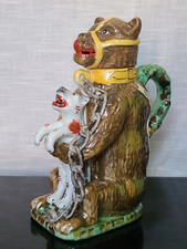 Staffordshire Reproduction Bear Baiting Jug with Dog Advertising Bear Grease