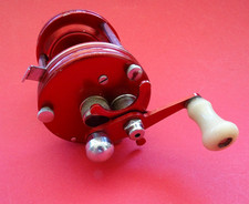 A GOOD USED VINTAGE EARLY 4 SCREW ABU AMBASSADEUR 6000 MULTIPLIER REEL
