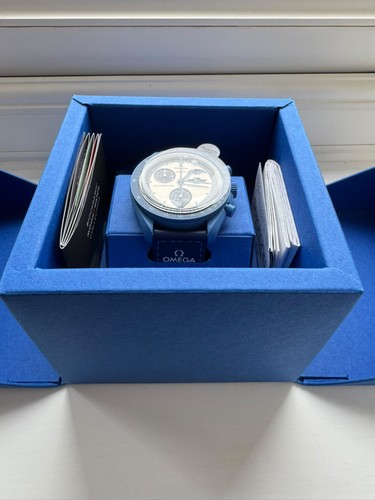 Swatch omega mission the - x,