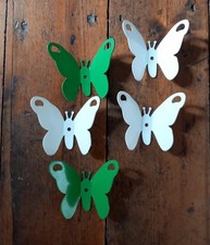 Decorative metal butterflies. Green and white. Pluto Produkter Sweden