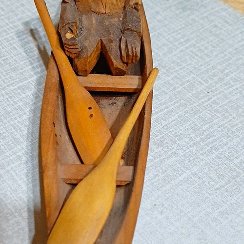 Hand carved brown wooden canoe - hand-carved,