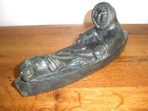 Inuit style carving eskimo - style,