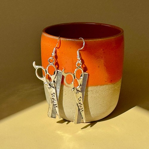 Silver scissors and - and, comb