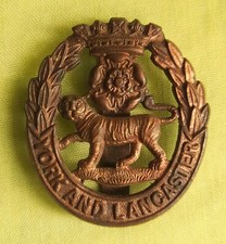 ECONOMY BRASS YORK AND LANCASTER REGIMENT CAP BADGE - C951