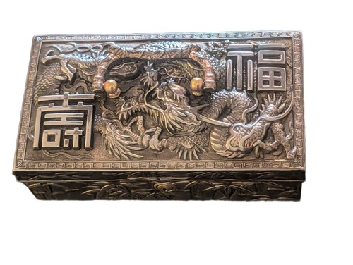 Embossed heavy white metal