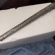 An Indian silver  parasol