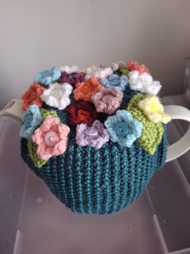 Hand knitted green flowers tea - knitted,