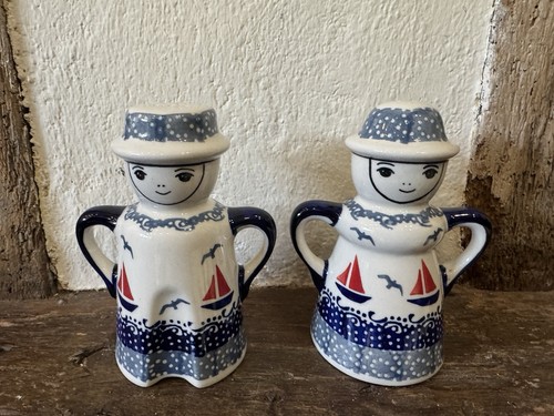 Salt and pepper shakers - and,