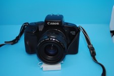 Canon EOS 750 35mm SLR Film Camera + Canon EF 35-70mm auto lens.
