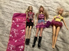2 Barbie Dolls And A Random Doll Each With An outfit 2010 Approx 