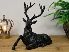 Laying down stag black - down,