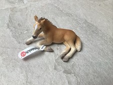Lying down schleich - schleich, foal