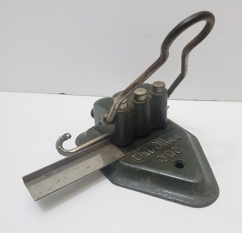 Vintage cast iron tri mee - tri,