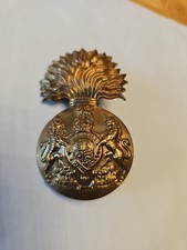 This is a cap badge of the Royal Scots Fusiliers regiment of the British Army.
