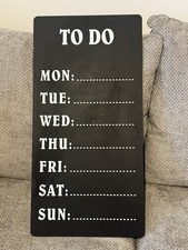 Chalkboard To Do List. Large chalkboard with days of the week listed.