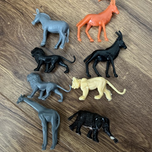 Plastic animals lions donkey
