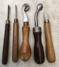 FIVE VINTAGE LEATHER WORKING