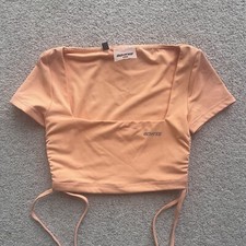 BO AND TEE OH POLLY SIZE XXS SIZE 4 PEACH CORAL ORANGE WORKOUT TIE CROP TOP BRA