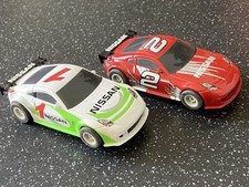 Micro scalextric two nissans - two,