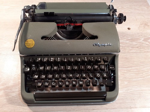Vintage typewriter olympia - typewriter,