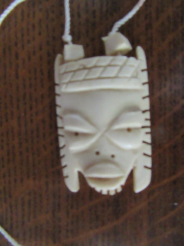 African carved bovine bone - african,