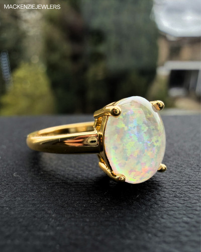 Synthetic white opal oval - synthetic,