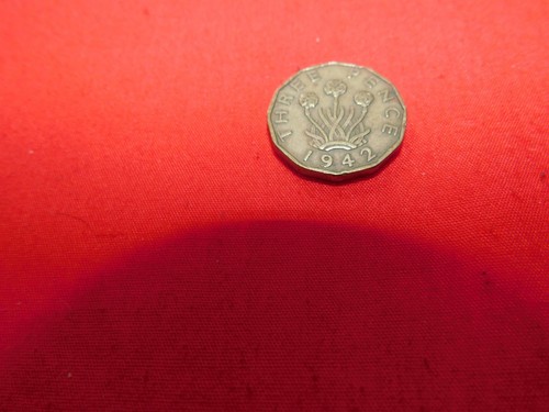 Collectable three pence - three,