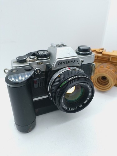 Olympus om10 slr camera with - camera.,