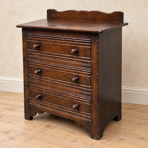 Ercol oak three drawer - three,