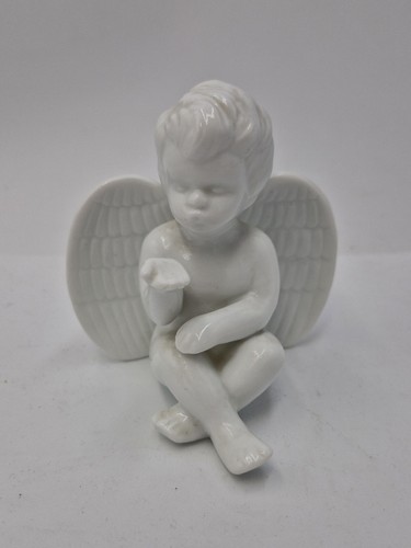 Cherub angel figurine - figurine, shelf