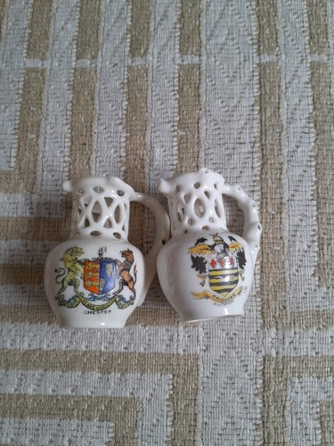Two puzzle jug crested china - two,