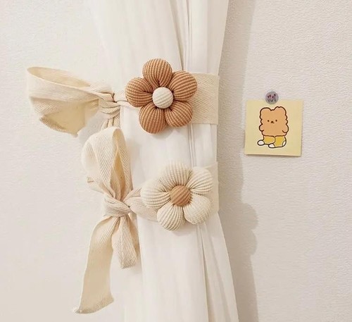 Pair daisy curtain tie - of,