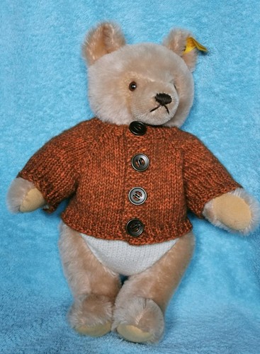 Hand knitted teddy bear