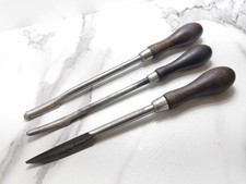 THREE BEARING SCRAPERS BY