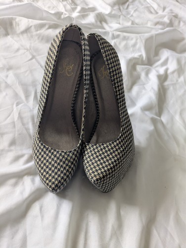 Worn womens black and - , white