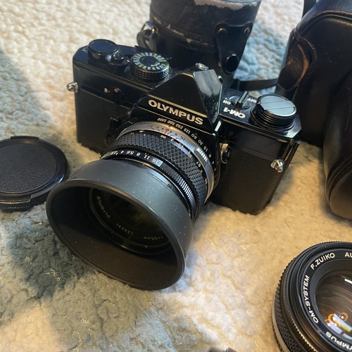 Olympus om1 black and three - om1,