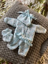 Hand Knitted dolls clothes to